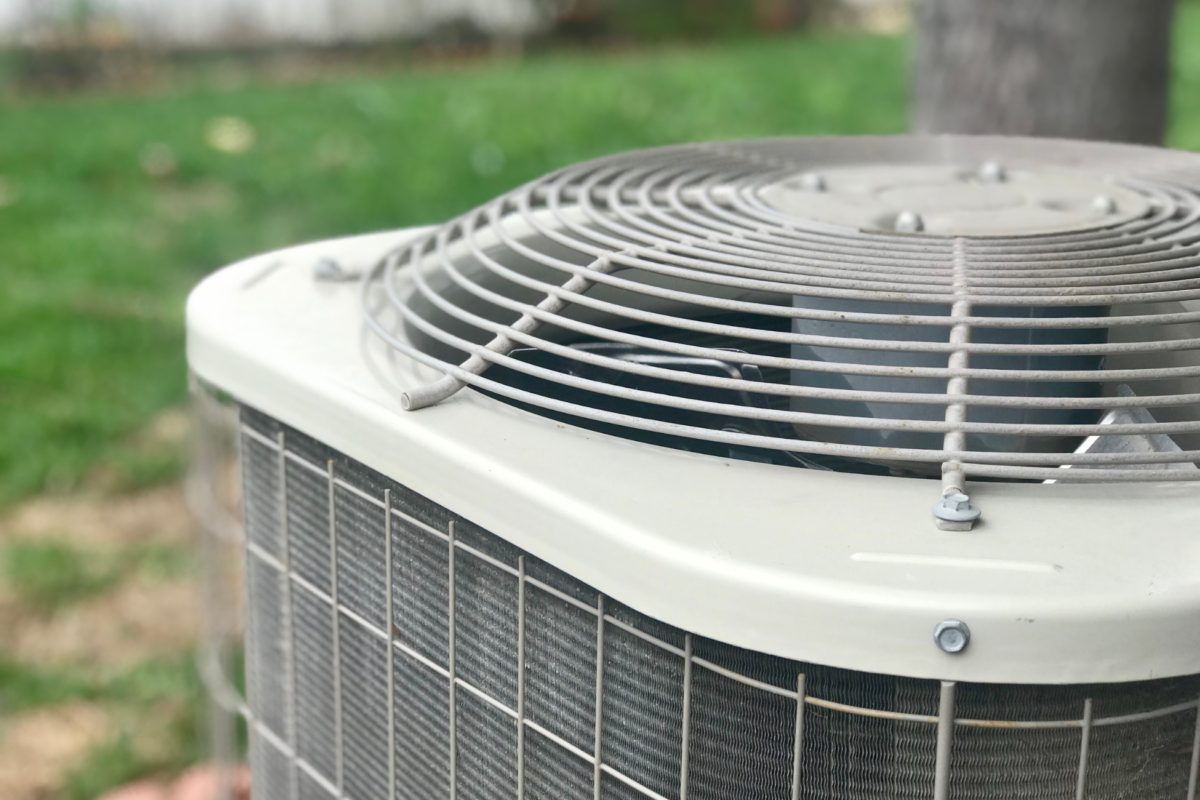An outdoor air conditioner works with a forced air system to provide cooling.