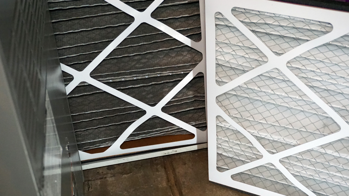 This filter comparison between a new and dirty filter demonstrate how important it is for air quality to keep a clean filter at all times.