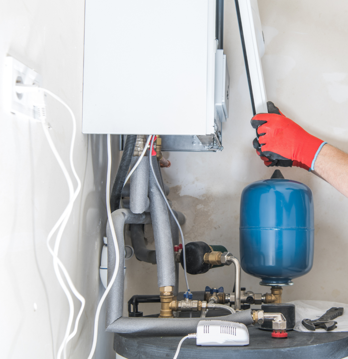technician taking cover off boiler 1