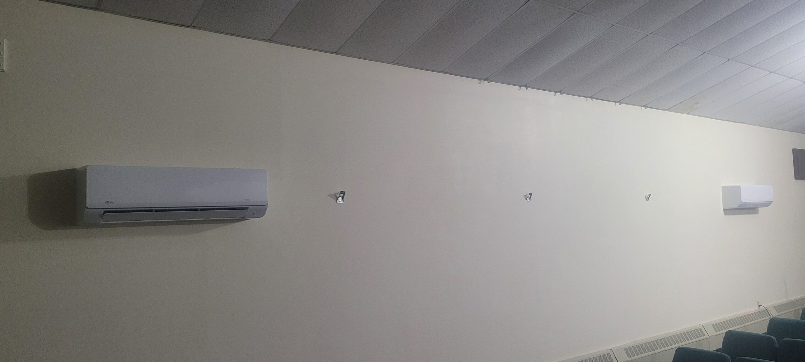 Two indoor ductless heat pump heads give needed cooling to this large indoor space.