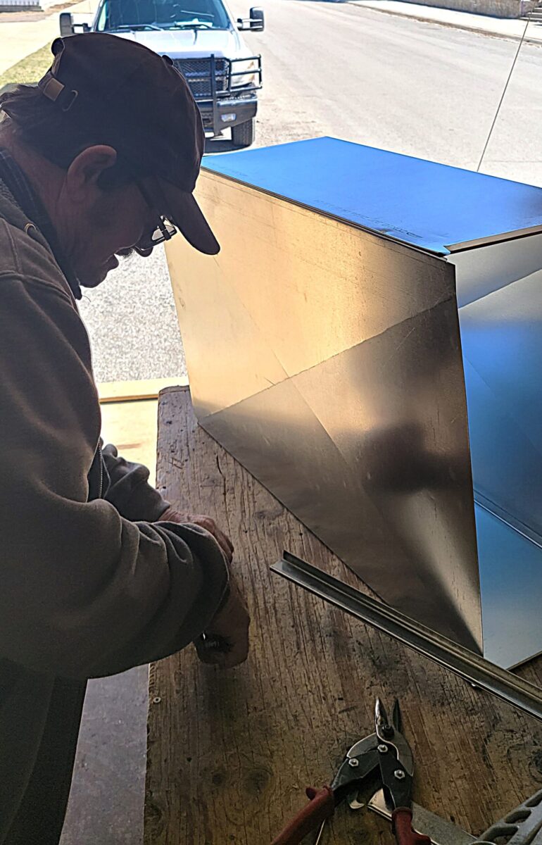 Fabricating custom ductwork is all part of the job for Chris.