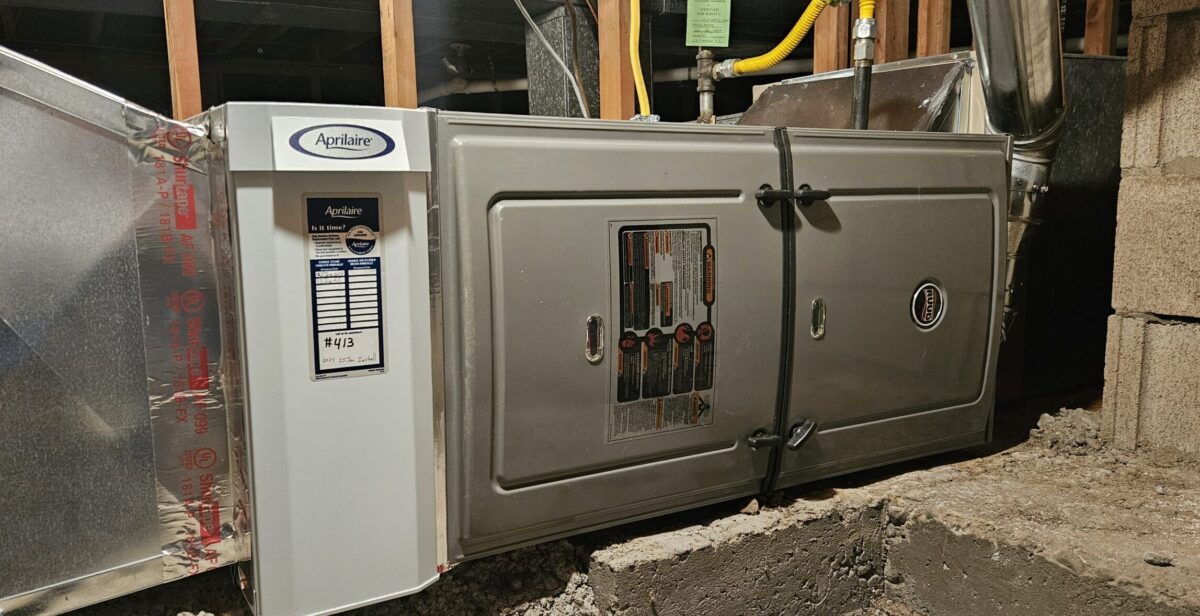 This furnace was installed in the crawl space of a Great Falls home. It includes an annual filter.